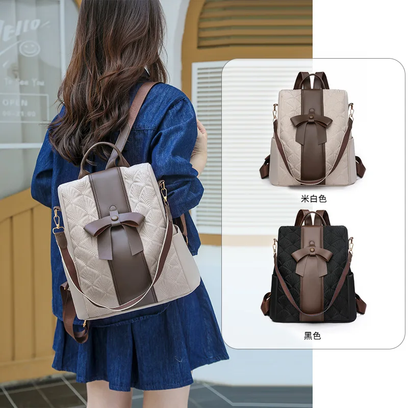 Lightweight nylon leather spliced women's backpack with contrasting colors and cute bow multi-purpose travel single-shoulder bag
Lightweight nylon leather spliced women's backpack with contrasting colors and cute bow multi-purpose travel single-shoulder bag