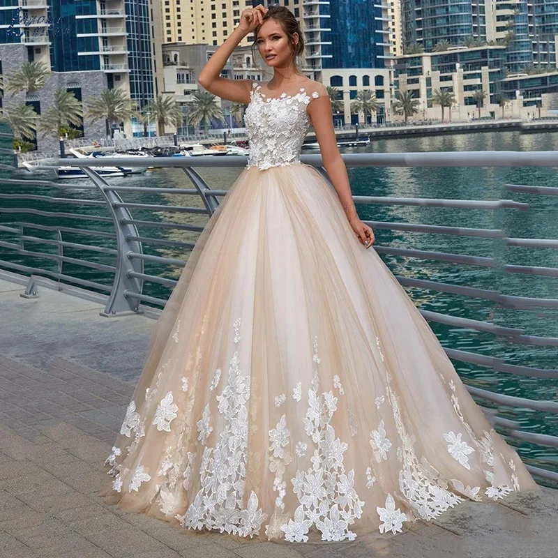 Elegant Champagne Tulle Wedding Dresses Ball Gown Illusion Neck Cap Sleeves Lace Appliques Bridal Gowns Bride Robes De Soirée
Elegant Champagne Tulle Wedding Dresses Ball Gown Illusion Neck Cap Sleeves Lace Appliques Bridal Gowns Bride Robes De Soirée