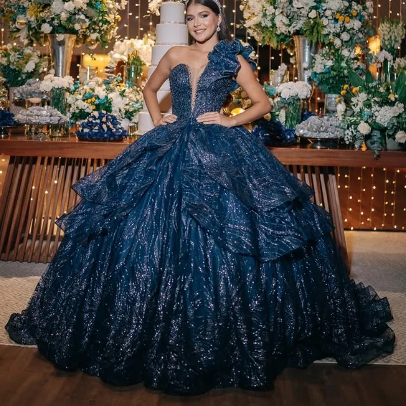 Блестящее темно-синее платье Quinceanera с открытыми плечами по индивидуальному заказу, аппликация с блестками и кристаллами, длинный хвост, рюши, платья de 15, Quinceanera
Блестящее темно-синее платье Quinceanera с открытыми плечами по индивидуальному заказу, аппликация с блестками и кристаллами, длинный хвост, рюши, платья de 15, Quinceanera