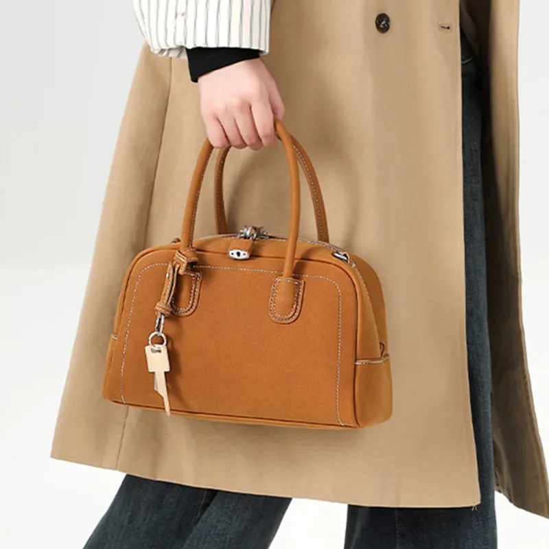 2025 New Fashion Niche Design Women's Handbag Leather Commuter Bowling Bag Single Shoulder Crossbody Boston Bags
2025 New Fashion Niche Design Women's Handbag Leather Commuter Bowling Bag Single Shoulder Crossbody Boston Bags