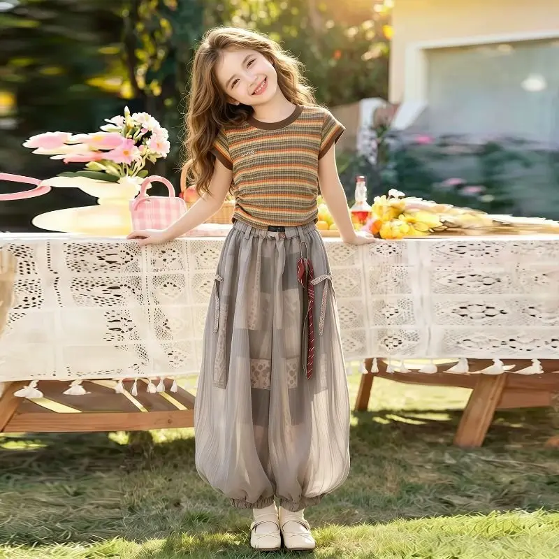 Kid Girl Casual Fashion 2-Piece Set Ribbed Striped Tank Top with Drawstring Detail+Sheer Wide Leg Pants Summer Streetwear Outfit
Kid Girl Casual Fashion 2-Piece Set Ribbed Striped Tank Top with Drawstring Detail+Sheer Wide Leg Pants Summer Streetwear Outfit