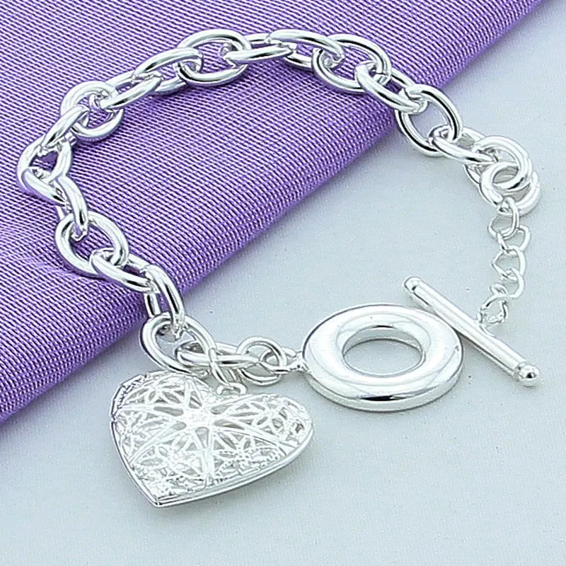 European and American Charm Jewelry Women's 925 Sterling Silver Jewelry TO Buckle Mesh Heart Photo Frame Pendant Bracelet
European and American Charm Jewelry Women's 925 Sterling Silver Jewelry TO Buckle Mesh Heart Photo Frame Pendant Bracelet