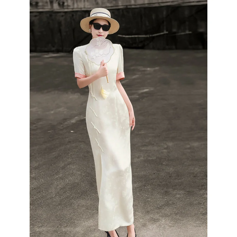 MEXCOCO 2026 Summer Chinese Style Jacquard Maxi Cheongsam Stand Collar Short Sleeve Frog Button Side Split Elegant Women Outfit
MEXCOCO 2026 Summer Chinese Style Jacquard Maxi Cheongsam Stand Collar Short Sleeve Frog Button Side Split Elegant Women Outfit