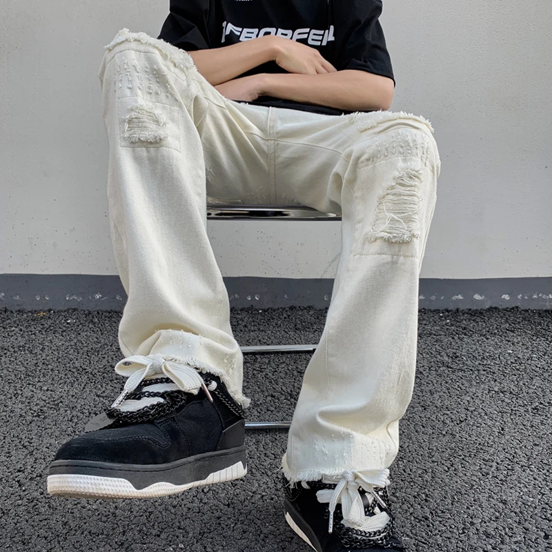 Мужские джинсы с рваным краем и потертостями, свободные, прямого кроя, белые, летние, модные, в стиле стритвир, винтажные, американские
Мужские джинсы с рваным краем и потертостями, свободные, прямого кроя, белые, летние, модные, в стиле стритвир, винтажные, американские