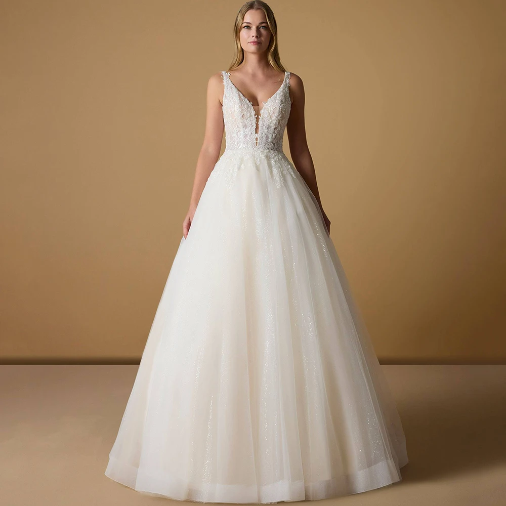 Formal Sleeveless Wedding Dress Classic V-Neck A-Line Floor Length Shiny Tulle Applique Bridal Backless Sweep Train Gowns Robe
Formal Sleeveless Wedding Dress Classic V-Neck A-Line Floor Length Shiny Tulle Applique Bridal Backless Sweep Train Gowns Robe