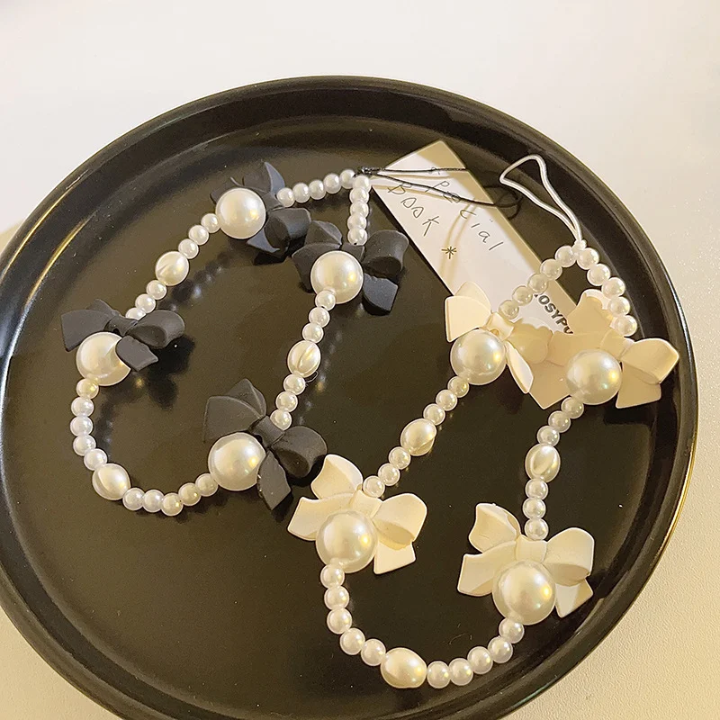 Pink Black Beaded Phone Chain Bowknot Acrylic Pearl Charm Strap Portable Mobile Lanyard Jewelry Gift
Pink Black Beaded Phone Chain Bowknot Acrylic Pearl Charm Strap Portable Mobile Lanyard Jewelry Gift