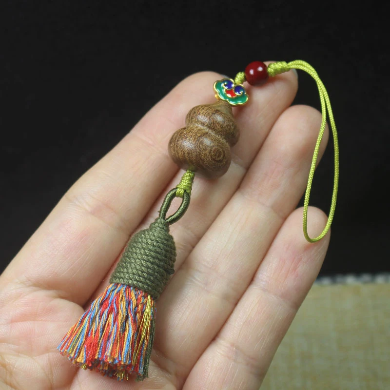Golden Sandalwood Gourd Fortune Pendant for Men and Women, Wooden Phone Chain, Bag Ornament, Simple Gift Accessory
Golden Sandalwood Gourd Fortune Pendant for Men and Women, Wooden Phone Chain, Bag Ornament, Simple Gift Accessory