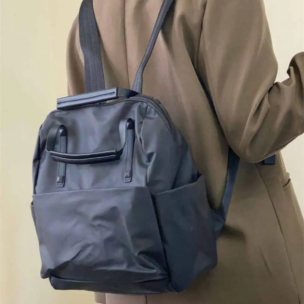 Black Lightweight Computer Bag Solid Color Korean Style Nylon Shoulder Bag Large Capacity Tote Bag Waterproof Travel Backpack
Black Lightweight Computer Bag Solid Color Korean Style Nylon Shoulder Bag Large Capacity Tote Bag Waterproof Travel Backpack