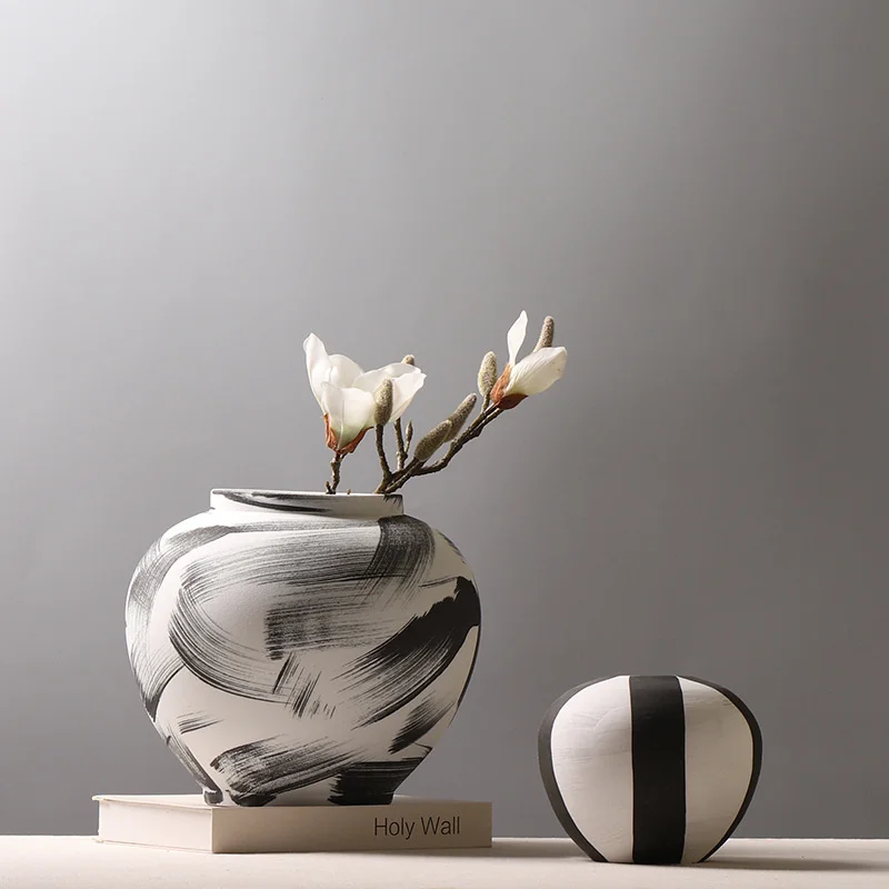 New Chinese style ceramic pot model room, flower rack, creative flower arrangement decoration, study, sword pot, vase, ink
New Chinese style ceramic pot model room, flower rack, creative flower arrangement decoration, study, sword pot, vase, ink