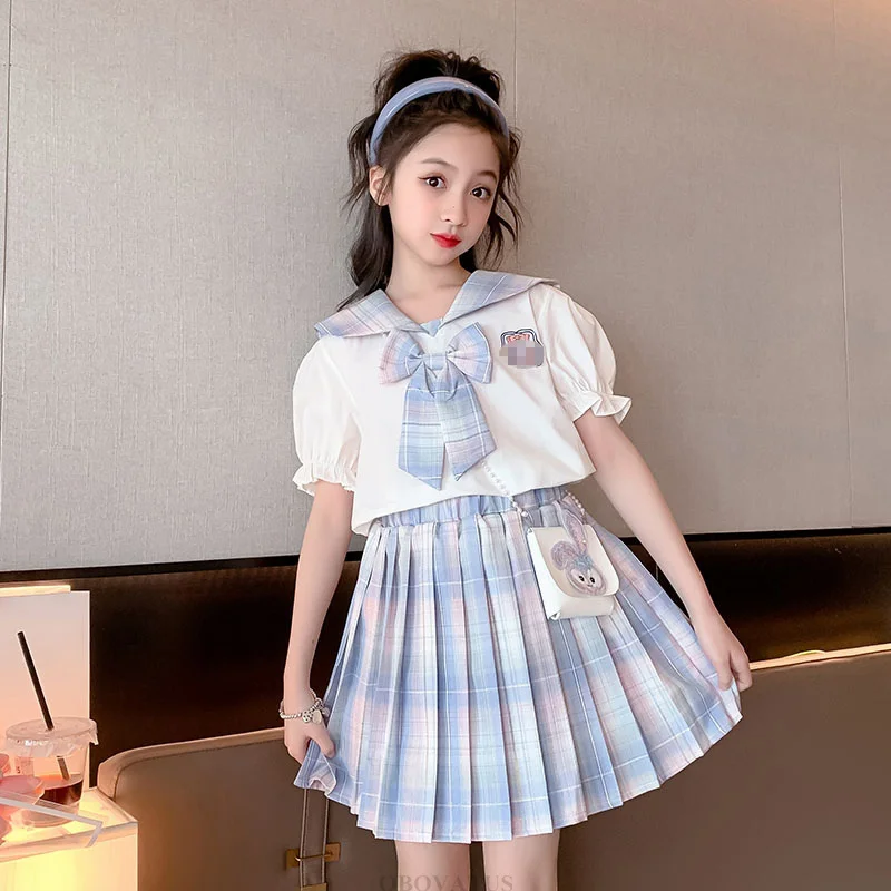 2026 Summer Baby Girls Uniform Clothes Set Child Tops Shirt+Blouse 2Pieces Suits Teenager Outfits With Bow Kids School Outerwear
2026 Summer Baby Girls Uniform Clothes Set Child Tops Shirt+Blouse 2Pieces Suits Teenager Outfits With Bow Kids School Outerwear