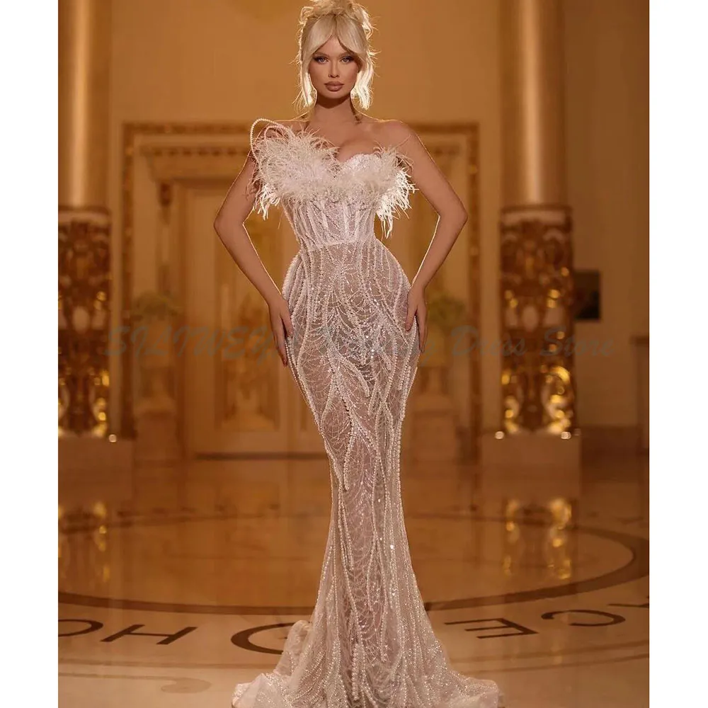 Exquisite Mermaid Wedding Dresses Sleeveless Bateau Feather 3D Lace Hollow Appliques Sequins Beaded Sexy Floor Length Plus Size
Exquisite Mermaid Wedding Dresses Sleeveless Bateau Feather 3D Lace Hollow Appliques Sequins Beaded Sexy Floor Length Plus Size