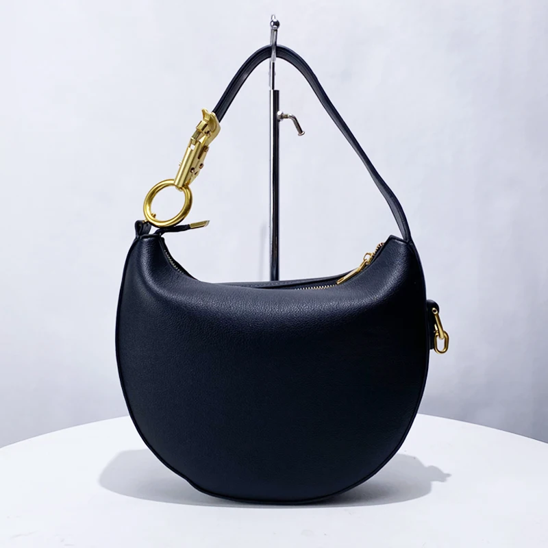 Сумки в форме полумесяца для женщин, роскошные дизайнерские сумки и кошельки, новые простые модные сумки из искусственной кожи для поездок на работу, женские сумки на плечо
Сумки в форме полумесяца для женщин, роскошные дизайнерские сумки и кошельки, новые простые модные сумки из искусственной кожи для поездок на работу, женские сумки на плечо