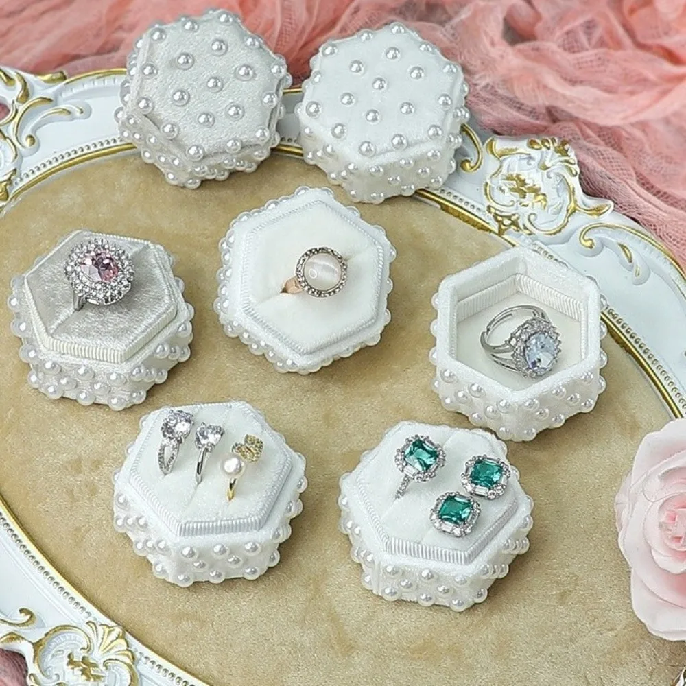 Pearl Velvet Ring Box 2/3 Slots with Detachable Lid Elegant Jewelry Box Hexagon Wedding Decor Ring Gift Box for Wedding Ceremony
Pearl Velvet Ring Box 2/3 Slots with Detachable Lid Elegant Jewelry Box Hexagon Wedding Decor Ring Gift Box for Wedding Ceremony