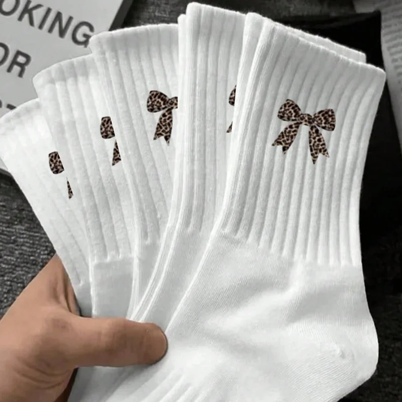12 pairs of women's mid length socks, leopard print bow pattern, versatile trendy and fashionable sports socks
12 pairs of women's mid length socks, leopard print bow pattern, versatile trendy and fashionable sports socks