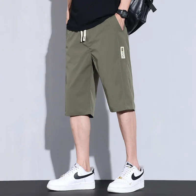 High Quality Summer Ice Silk Men's Capri Pants Elastic Waist Loose Fit Thin Breathable Quick Dry Sports Casual Trousers Male
High Quality Summer Ice Silk Men's Capri Pants Elastic Waist Loose Fit Thin Breathable Quick Dry Sports Casual Trousers Male