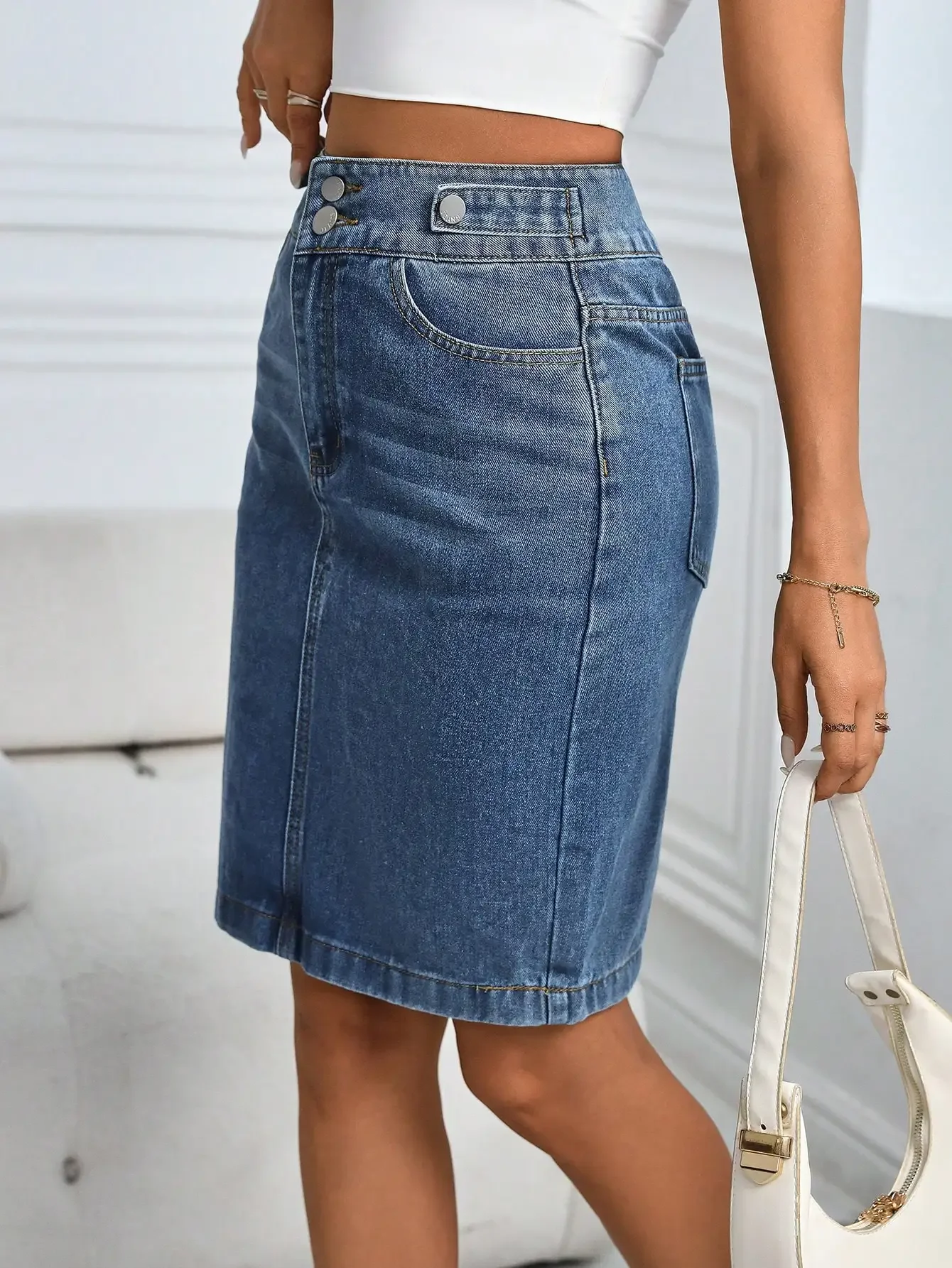 Stone Washed High-Waisted Straight Cut Denim Skirt with Dual Button Closure
Stone Washed High-Waisted Straight Cut Denim Skirt with Dual Button Closure