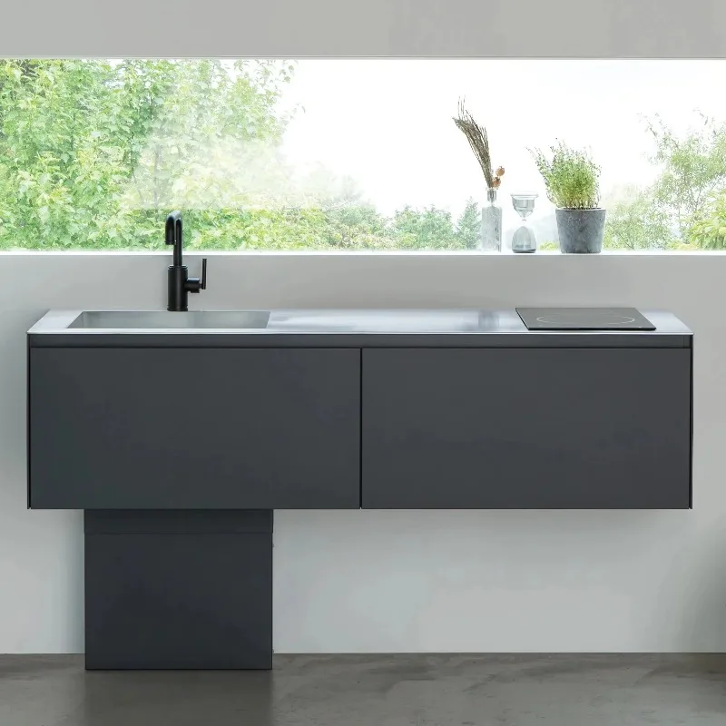 Современный минималистичный кухонный остров из нержавеющей стали: матовый серый/черный кухонный шкаф со встроенной раковиной и столешницей
Современный минималистичный кухонный остров из нержавеющей стали: матовый серый/черный кухонный шкаф со встроенной раковиной и столешницей