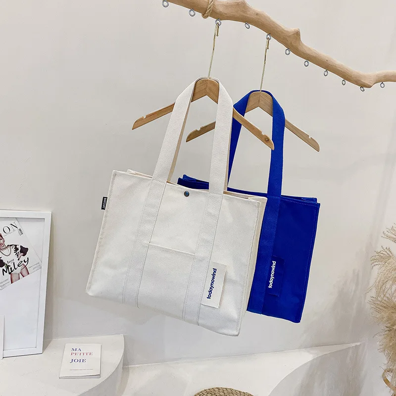 Простая однотонная холщовая сумка через плечо для женщин, корейская вместительная дорожная сумка-тоут, универсальная сумка для студенток и школьниц
Простая однотонная холщовая сумка через плечо для женщин, корейская вместительная дорожная сумка-тоут, универсальная сумка для студенток и школьниц