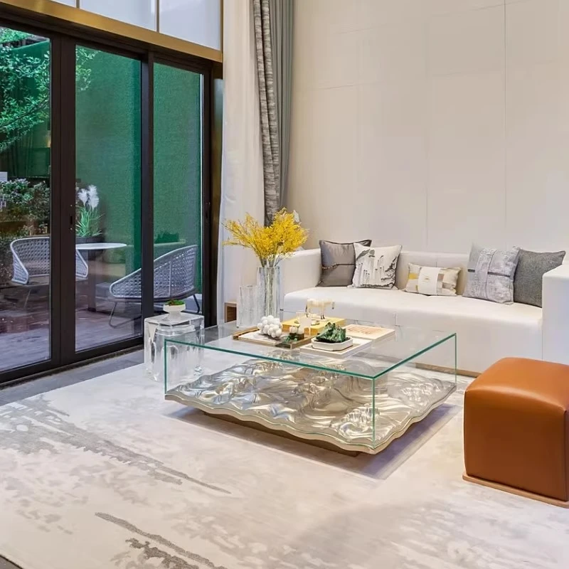 Designer FRP electroplating wave coffee table water ripple transparent glass cover rectangular reception table model room
Designer FRP electroplating wave coffee table water ripple transparent glass cover rectangular reception table model room