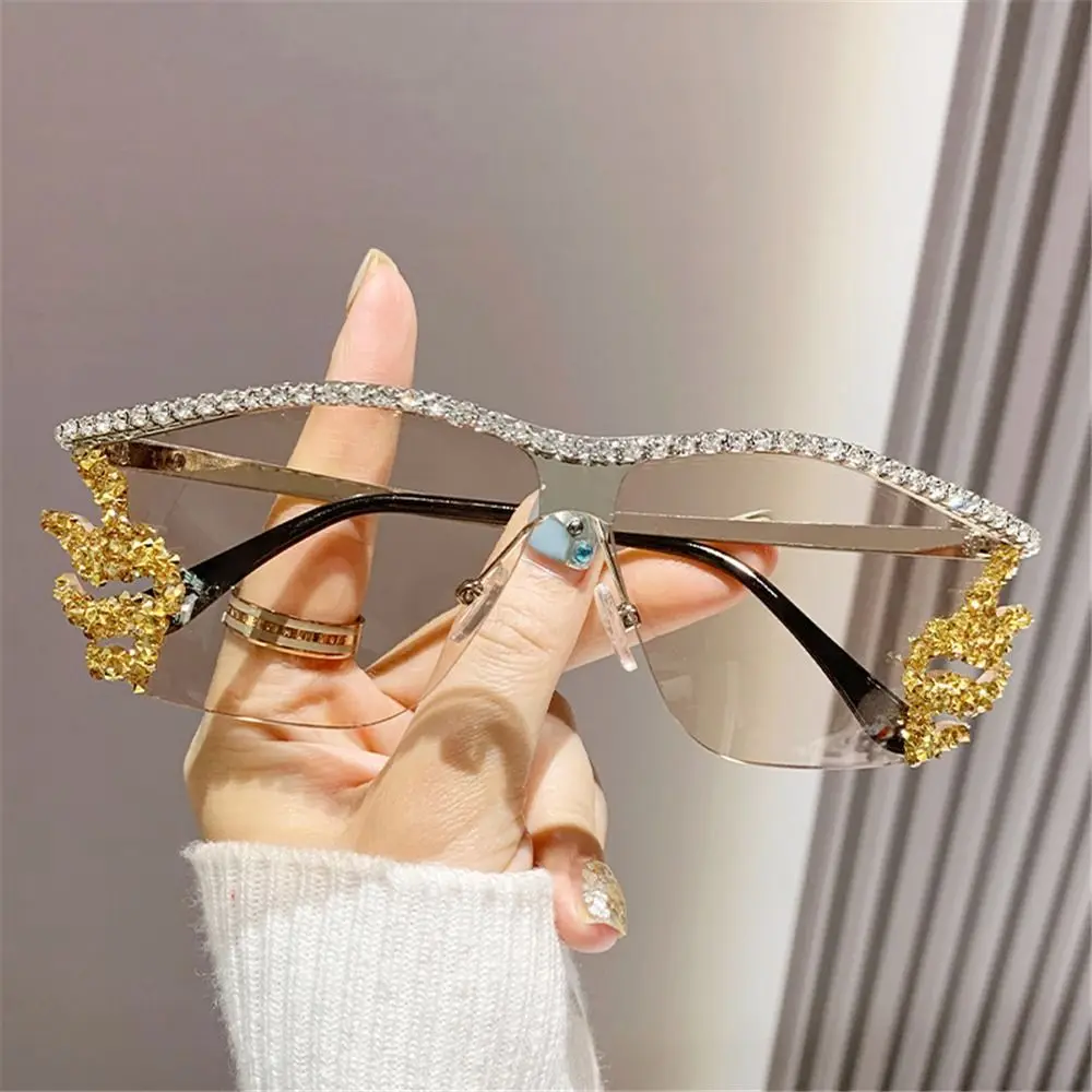 Popular Y2K Rimless Sunglasses Irregular Punk Diamond Crystal Shades Luxury Designer UV400 Protection Metal Glasses for Women
Popular Y2K Rimless Sunglasses Irregular Punk Diamond Crystal Shades Luxury Designer UV400 Protection Metal Glasses for Women