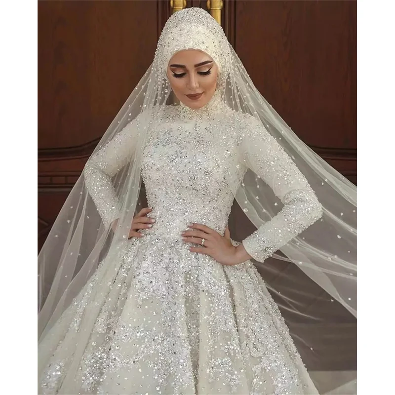 Elegant Prom Dress Long Sleeves High Neck Bridal Long Ball Gown 2024 Sparkle Appliques Sequin Crystals Robe De mariée
Elegant Prom Dress Long Sleeves High Neck Bridal Long Ball Gown 2024 Sparkle Appliques Sequin Crystals Robe De mariée