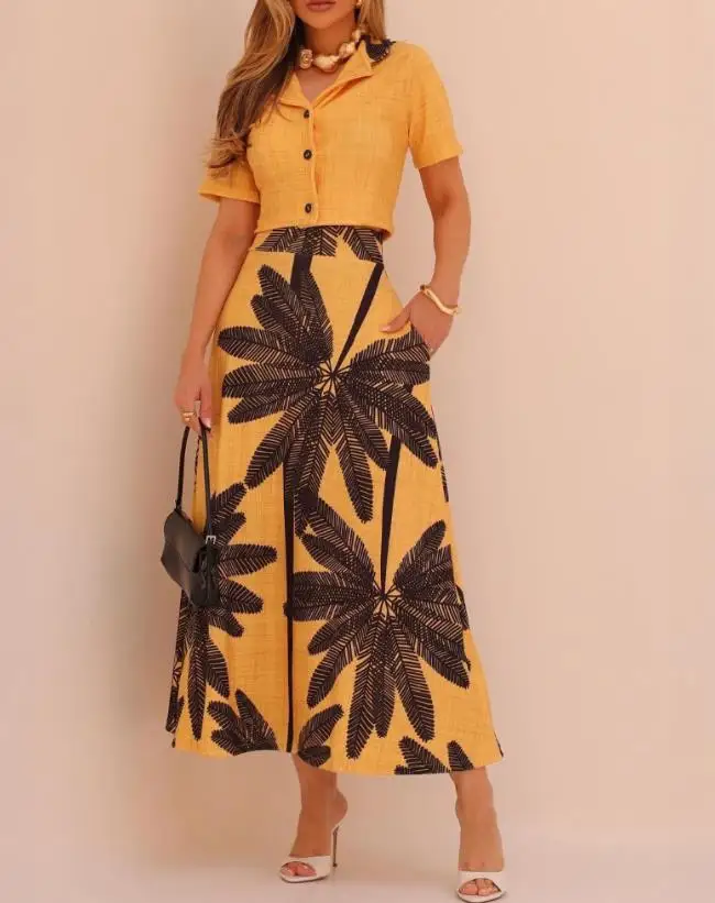 2025 Summer Women's Casual 2-Piece Set with Lapel Buttons, Exposed Navel Top and Tropical Printed High Waisted Long Skirt Set
2025 Summer Women's Casual 2-Piece Set with Lapel Buttons, Exposed Navel Top and Tropical Printed High Waisted Long Skirt Set