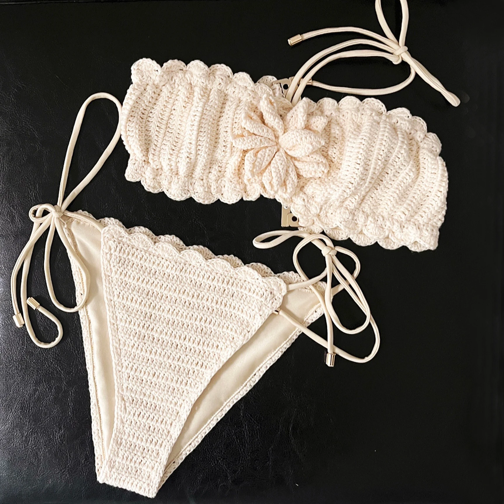 Awaken embellished crocheted cotton halterneck bikini
Awaken embellished crocheted cotton halterneck bikini