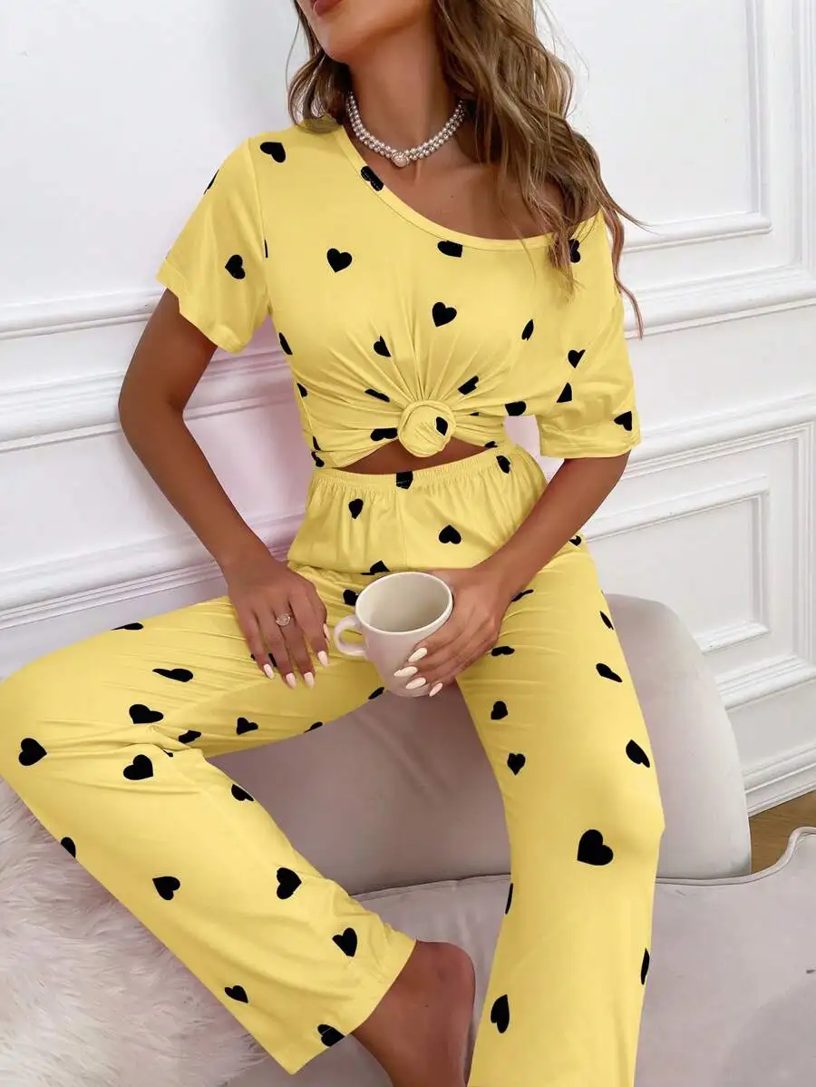 Yellow Heart Print Knotted Crop Top And Pants Pajama Set
Yellow Heart Print Knotted Crop Top And Pants Pajama Set