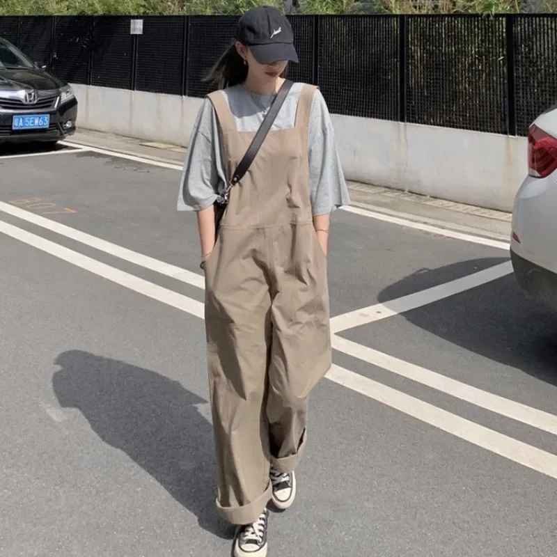2024 New Women's Summer Loose and Thin, All-match Age Reduction Tooling Casual Sling One-piece Wide-leg Trousers Women
2024 New Women's Summer Loose and Thin, All-match Age Reduction Tooling Casual Sling One-piece Wide-leg Trousers Women