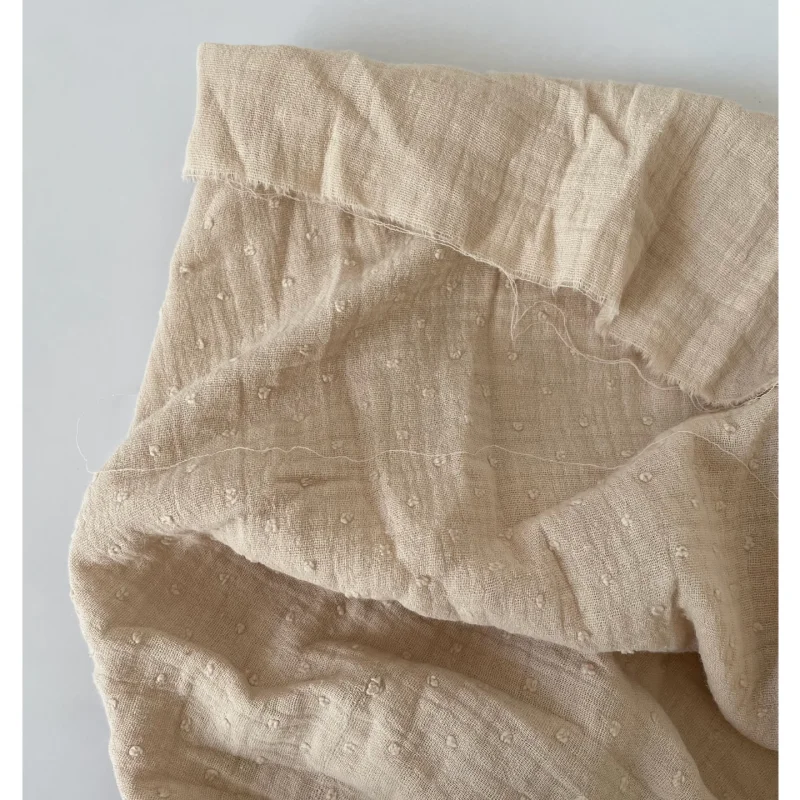 Beige double-layer yarn polka dot cotton fabric for clothing diy fabric
Beige double-layer yarn polka dot cotton fabric for clothing diy fabric