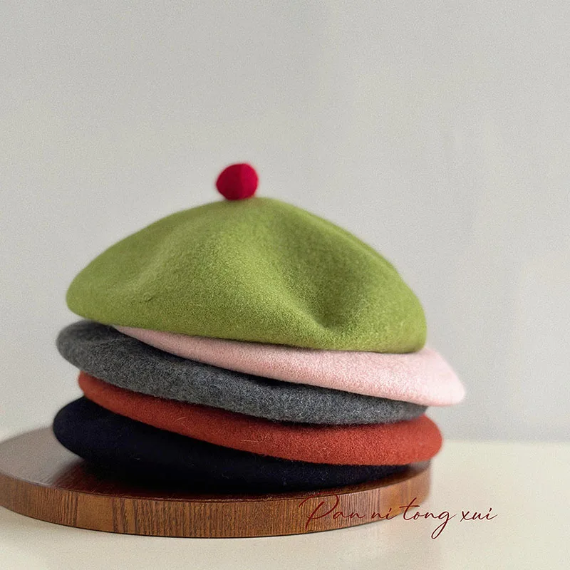 Trendy Wool Beret Hat with Pom Ball Autumn Winter Knitted Painter Caps for Women Retro Berets Fashion Small Face Warm Headwear
Trendy Wool Beret Hat with Pom Ball Autumn Winter Knitted Painter Caps for Women Retro Berets Fashion Small Face Warm Headwear