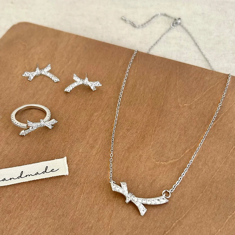 PONYKISS 925 Sterling Silver Full Zircon Bowknot Stud Earrings Ring Necklace for Women Cute Fine Jewelry Minimalist Accessories
PONYKISS 925 Sterling Silver Full Zircon Bowknot Stud Earrings Ring Necklace for Women Cute Fine Jewelry Minimalist Accessories