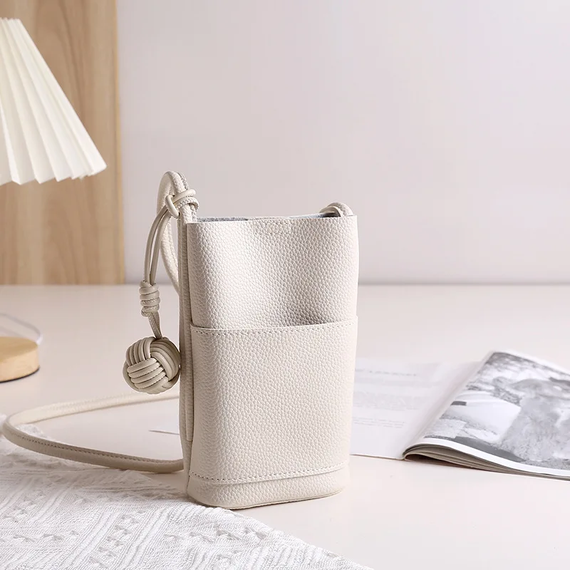 Soft Grainy PU Crossbody Women's Mobile Phone Bag 2025 Korean Style New Simple Lightweight Mini Bag with Hanging Weaving Ball
Soft Grainy PU Crossbody Women's Mobile Phone Bag 2025 Korean Style New Simple Lightweight Mini Bag with Hanging Weaving Ball