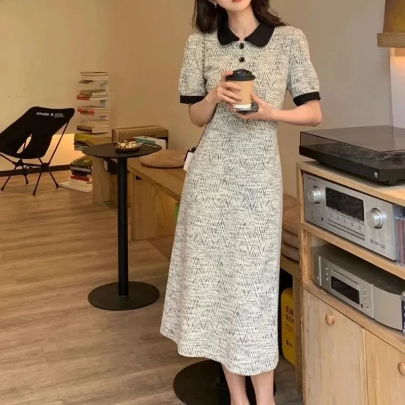 Women's Summer New French High-End Elegant Polo Neck Dress Tweed Style Slim Fit Mid-Length Skirt
Women's Summer New French High-End Elegant Polo Neck Dress Tweed Style Slim Fit Mid-Length Skirt