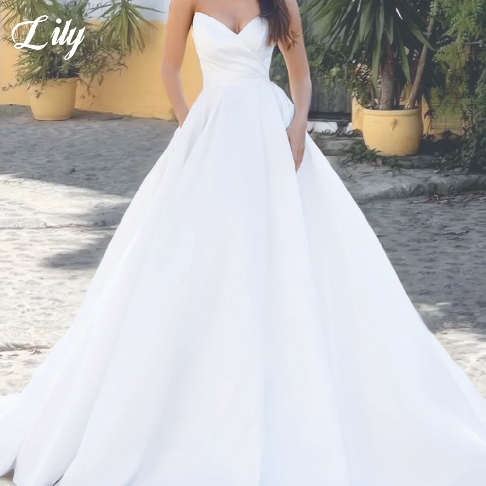 Lily White Elegant Wedding Dresses V-Neck Sleeveless Wedding Gown with Back Zipper Satin A-Line Trailing Bridal Gown Customized
Lily White Elegant Wedding Dresses V-Neck Sleeveless Wedding Gown with Back Zipper Satin A-Line Trailing Bridal Gown Customized