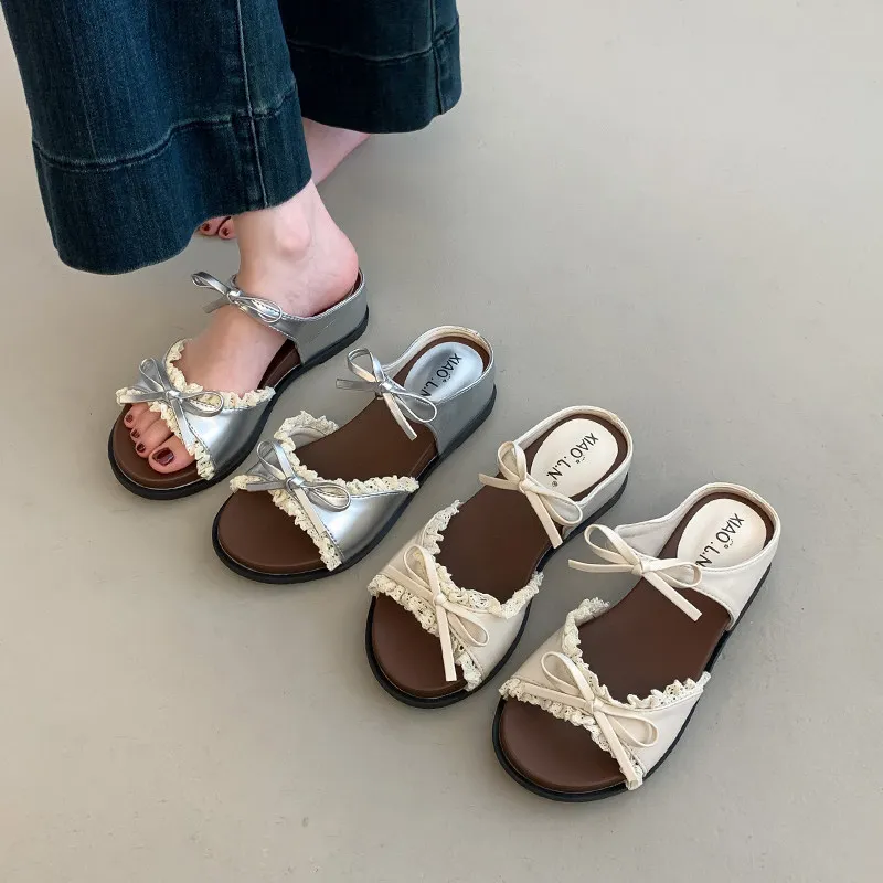 Womens Lace Bow Flat Slide Sandals Sweet Metallic Leather Open Toe Slip on Mules Soft Sole Beach Casual Slippers Female Footwear
Womens Lace Bow Flat Slide Sandals Sweet Metallic Leather Open Toe Slip on Mules Soft Sole Beach Casual Slippers Female Footwear