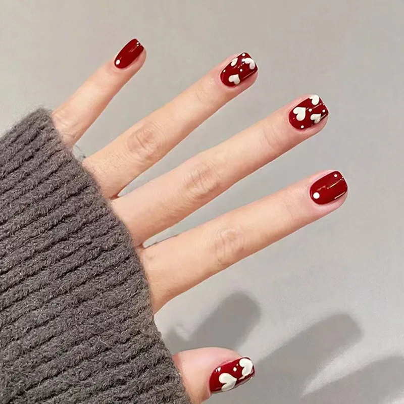 24pc Wine & White Heart Nails Euro Ballet ShapePress-Ons Non-Filing Required Short Length & Mix Sizes Fake Nails Set For Women
24pc Wine & White Heart Nails Euro Ballet ShapePress-Ons Non-Filing Required Short Length & Mix Sizes Fake Nails Set For Women