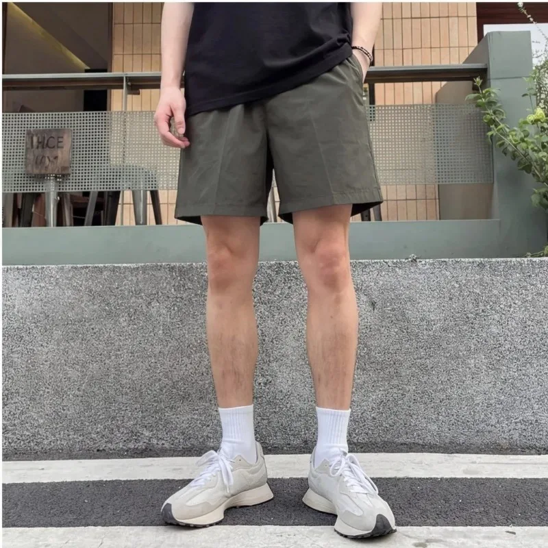 Men's Summer Casual Solid Color Shorts Loose Fit Breathable Streetwear Knee Length Shorts
Men's Summer Casual Solid Color Shorts Loose Fit Breathable Streetwear Knee Length Shorts