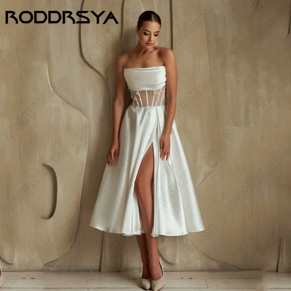 RODDRSYA A-Line Satin Wedding Gown Side Slit Strapless Backless Pearl Party Dress Sleeveless Sexy robe de mariée 2025 Customized
RODDRSYA A-Line Satin Wedding Gown Side Slit Strapless Backless Pearl Party Dress Sleeveless Sexy robe de mariée 2025 Customized