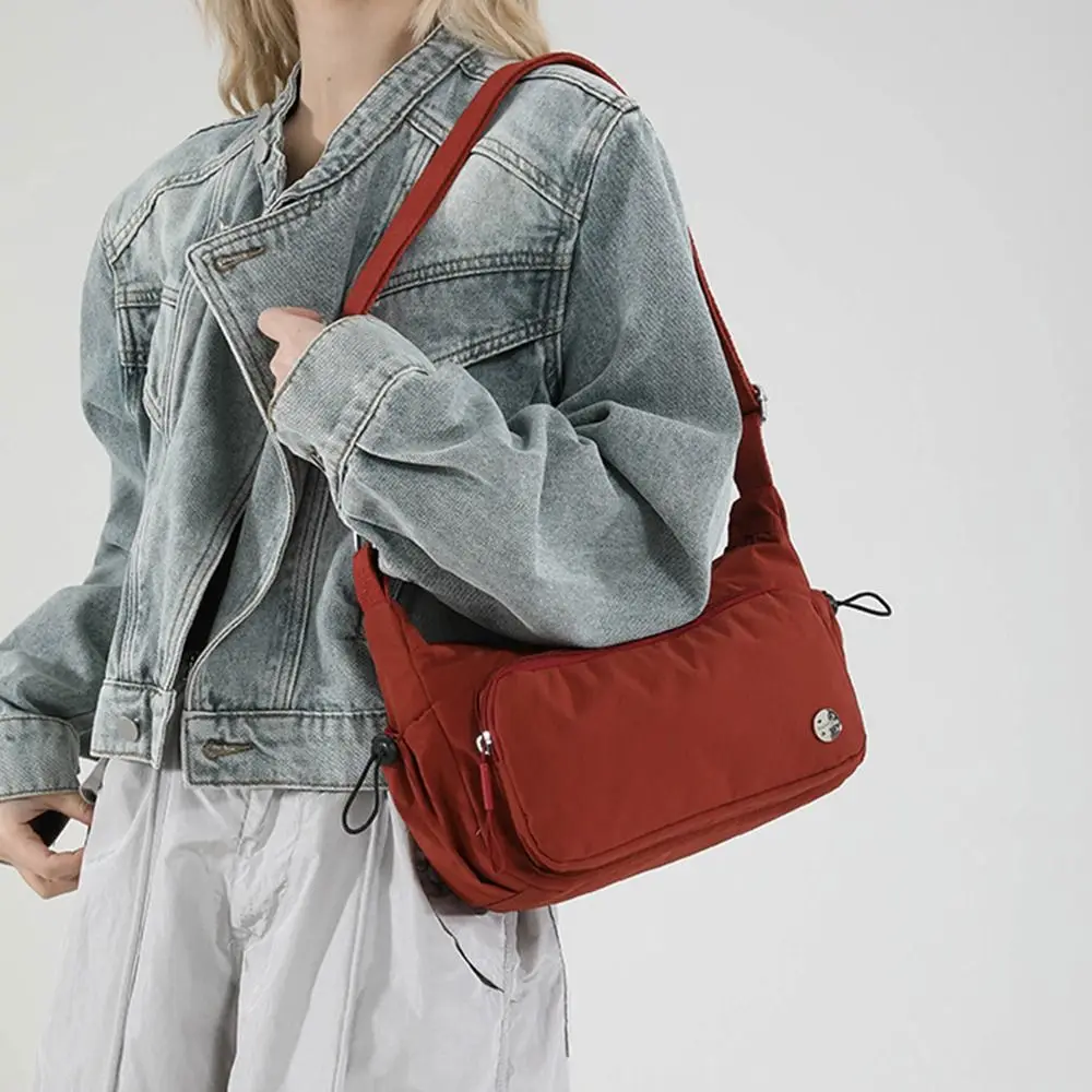 Fashion Casual Cross Body Bag Designer Simple Nylon Shoulder Bag Multiple Pockets Lightweight Commuting Sling Bag Female/Male
Fashion Casual Cross Body Bag Designer Simple Nylon Shoulder Bag Multiple Pockets Lightweight Commuting Sling Bag Female/Male