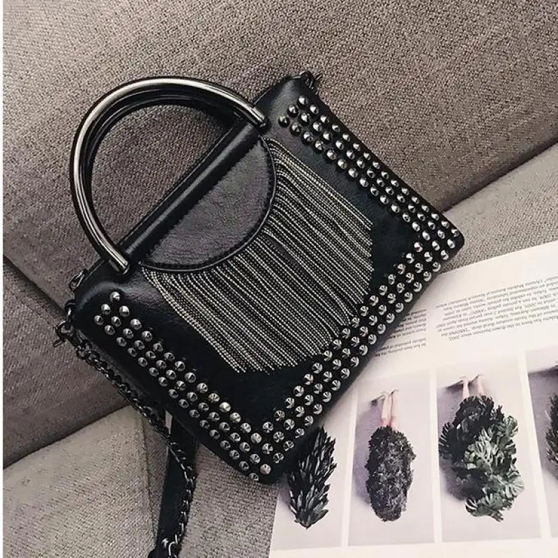 European/American Personalized Handbag With Rivets Tassel Chain Decoration Circular Metal Handle Horizontal Square Shoulder Bags
European/American Personalized Handbag With Rivets Tassel Chain Decoration Circular Metal Handle Horizontal Square Shoulder Bags