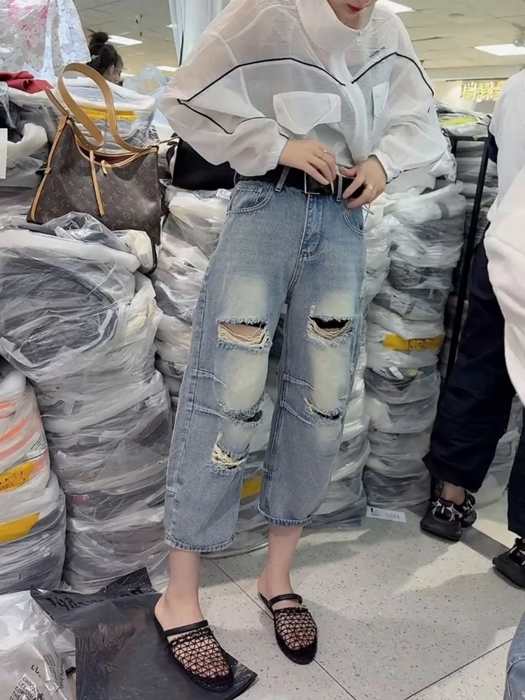 Summer new ripped jeans women high waisted and slim fit fashion and thin style versatile eight quarter straight leg pants
Summer new ripped jeans women high waisted and slim fit fashion and thin style versatile eight quarter straight leg pants