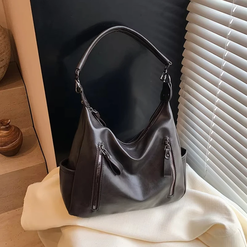 Универсальные повседневные женские сумки на плечо из искусственной кожи большой емкости, лидер продаж 2026, лаконичные молодежные сумки через плечо в стиле ретро для поездок на работу
Универсальные повседневные женские сумки на плечо из искусственной кожи большой емкости, лидер продаж 2026, лаконичные молодежные сумки через плечо в стиле ретро для поездок на работу