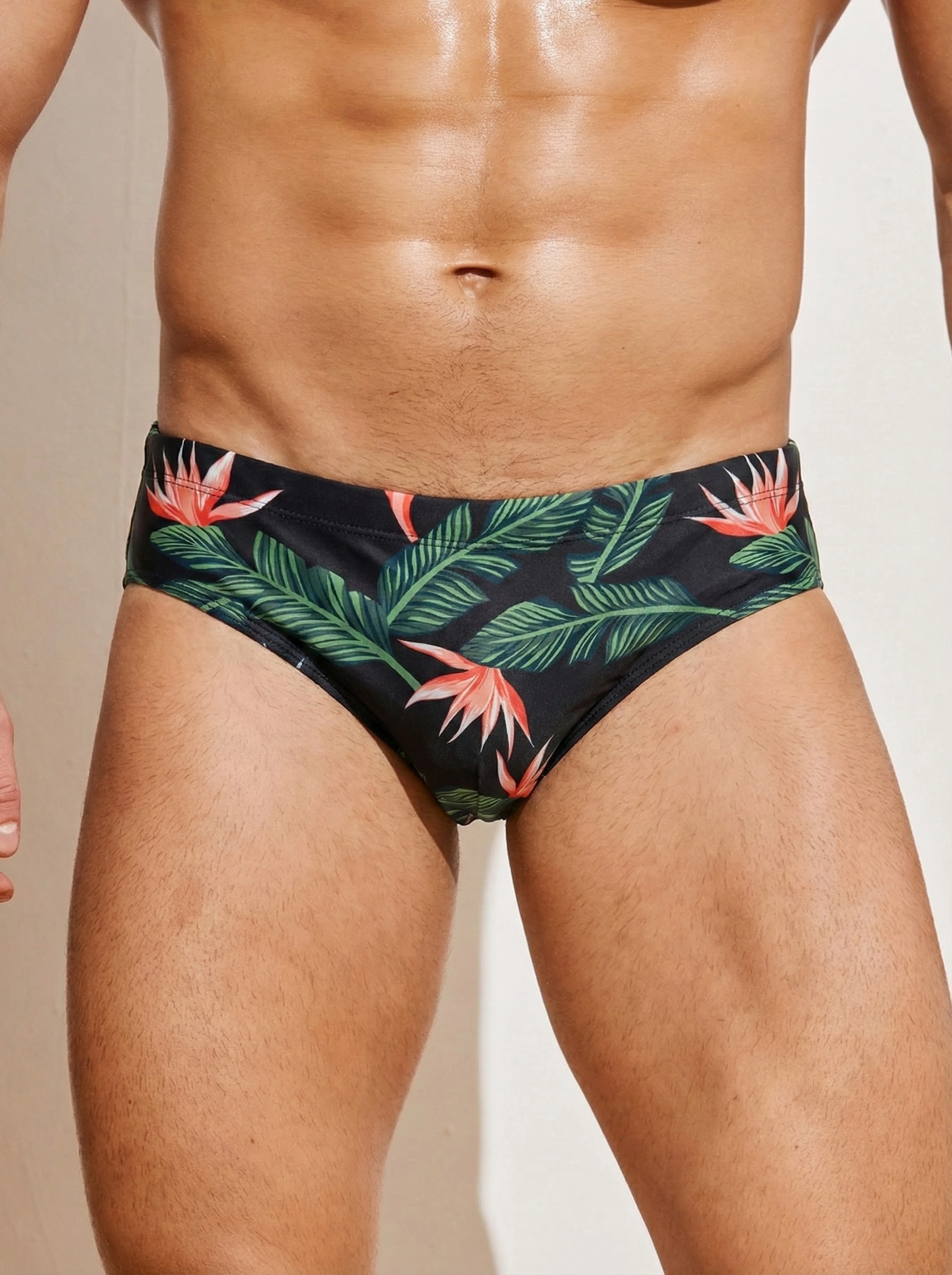 Men's summer tropical leaf pattern quick drying and high elasticity sports triangle swimsuit, men's swimsuit with ice sensation
Men's summer tropical leaf pattern quick drying and high elasticity sports triangle swimsuit, men's swimsuit with ice sensation