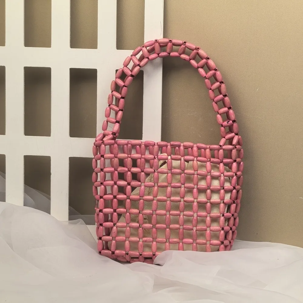 Portable Handmade Beaded Woven Bag Pure Color Creative Hollow Out Bag Boho Chic Openwork Bag Girls
Portable Handmade Beaded Woven Bag Pure Color Creative Hollow Out Bag Boho Chic Openwork Bag Girls