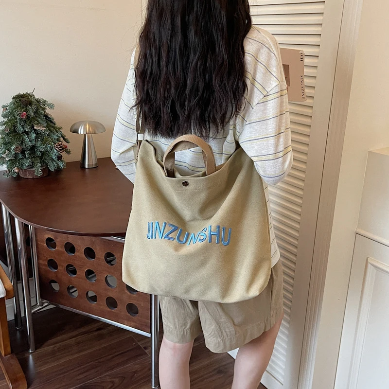 2026 New Women's Canvas Tote Bag Letter Embroidery Large Capacity Shoulder Bag Commuting Travel Fashion Handbag
2026 New Women's Canvas Tote Bag Letter Embroidery Large Capacity Shoulder Bag Commuting Travel Fashion Handbag