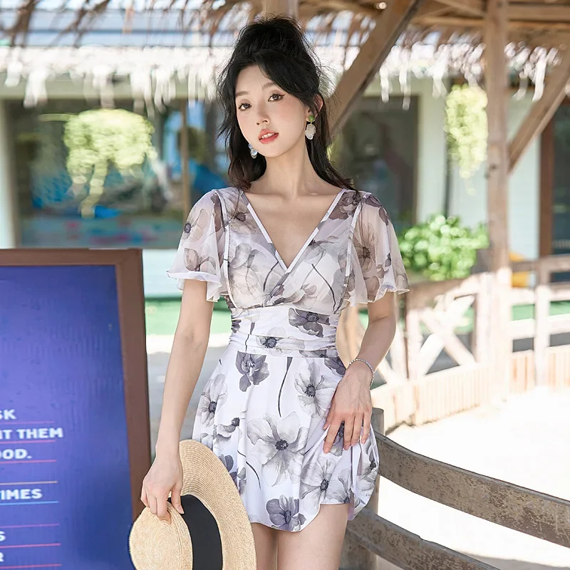 Korean Monokini Women Swimwear Dress One Piece Swimsuit Floral Ruffle Short Sleeve Bathing Suit Sexy Push Up Beach Wear 2025 New
Korean Monokini Women Swimwear Dress One Piece Swimsuit Floral Ruffle Short Sleeve Bathing Suit Sexy Push Up Beach Wear 2025 New