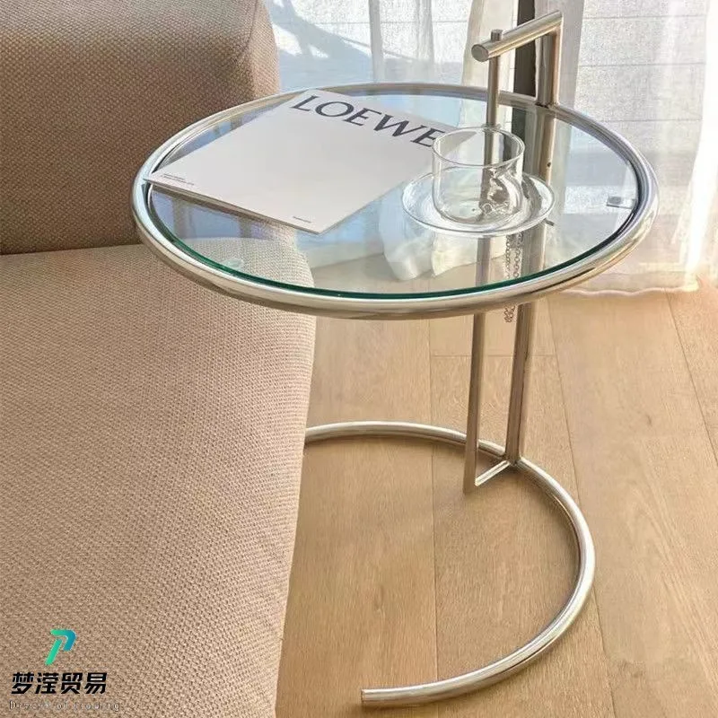 Lifting small coffee table stainless steel medieval glass edge table Nordic simple modern coffee round table
Lifting small coffee table stainless steel medieval glass edge table Nordic simple modern coffee round table