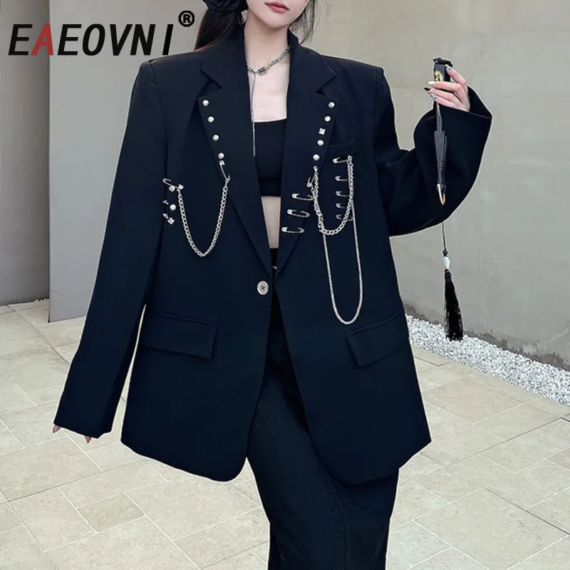 EAEOVNI Fashion Chain Spliced Design Black Suit Jacket For Women Single Button Loose Blazer Office Lady 2025 New Clothing 1A422
EAEOVNI Fashion Chain Spliced Design Black Suit Jacket For Women Single Button Loose Blazer Office Lady 2025 New Clothing 1A422