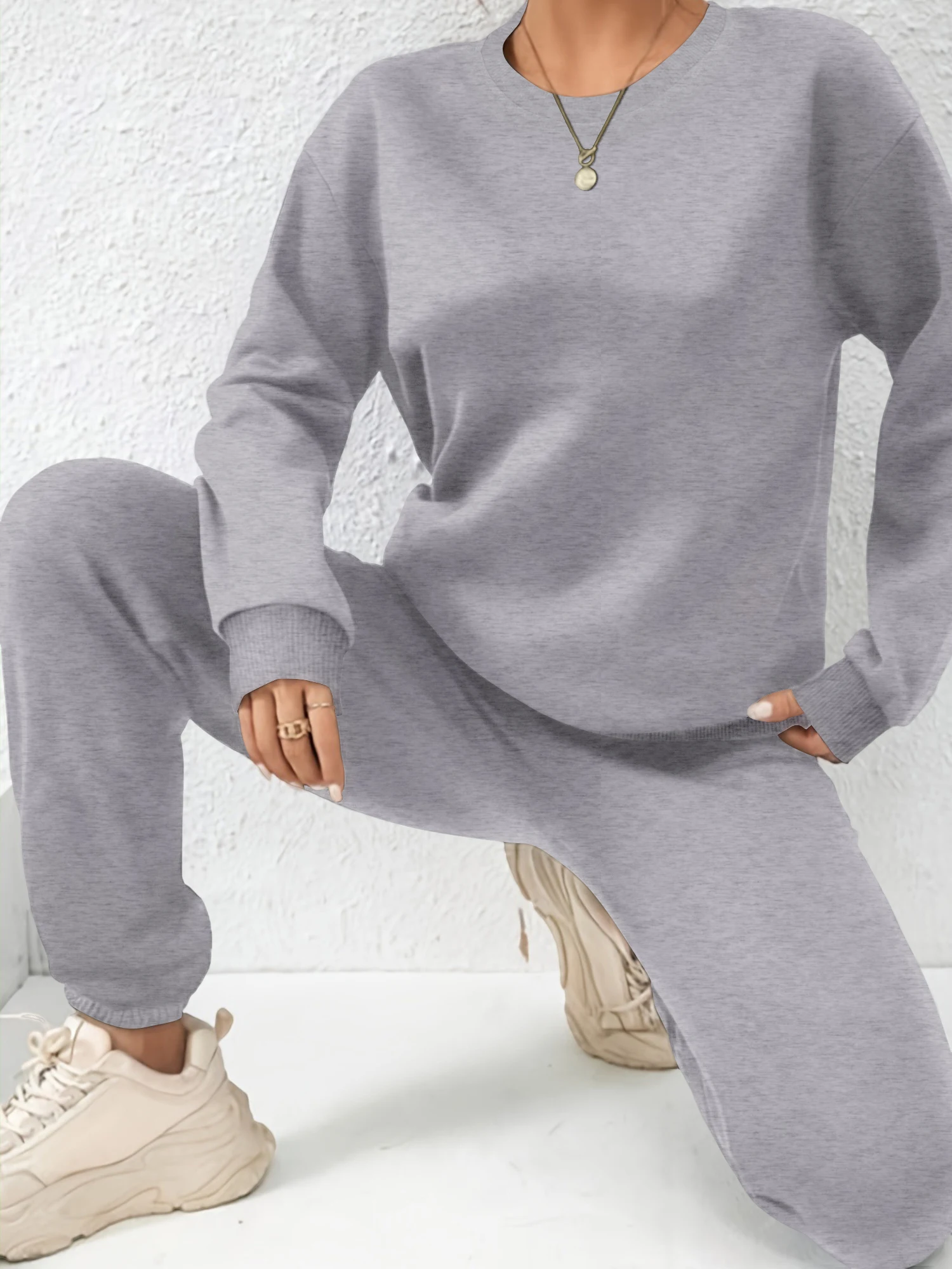Women Solid Color Sweatsuit, Crew Neck Sweatshirt & Cuff Jogger Pants, Casual Loose Two Piece Outfit
Women Solid Color Sweatsuit, Crew Neck Sweatshirt & Cuff Jogger Pants, Casual Loose Two Piece Outfit
